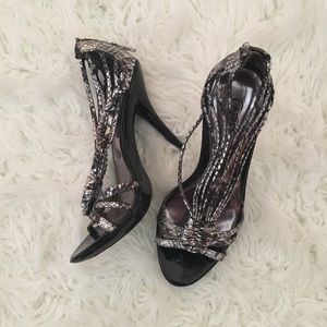 Black and silver Heels by Carlos Santana